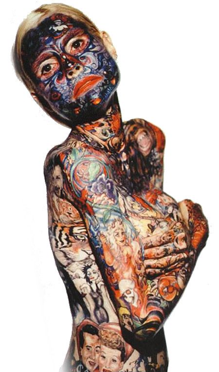  holds the Guinness Record for being the most tattooed woman in the world 