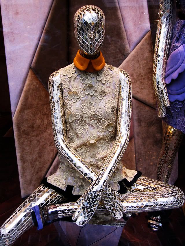 miu miu shop window new bond street london orange collar flowers